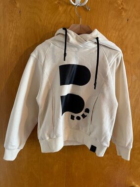 Toddler unisex Cream Hoodie with Bold Black Graphic